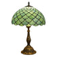 Tiffany-style table lamp with green stained-glass scallop shade and bronze base