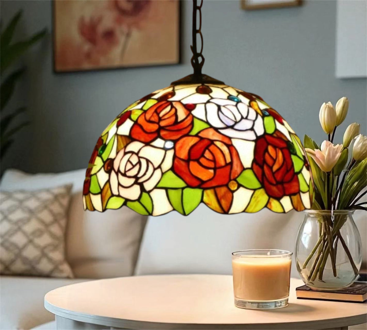 Stained glass pendant lamp with rose mosaic shade in red, orange, green, and white