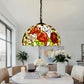 Stained glass pendant lamp shade with red and orange roses and white floral accents