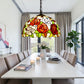 Stained glass pendant lamp with rose mosaic shade hanging from metal chain