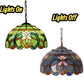 Tiffany-style stained glass pendant lamp with hanging chain, lights on/off view