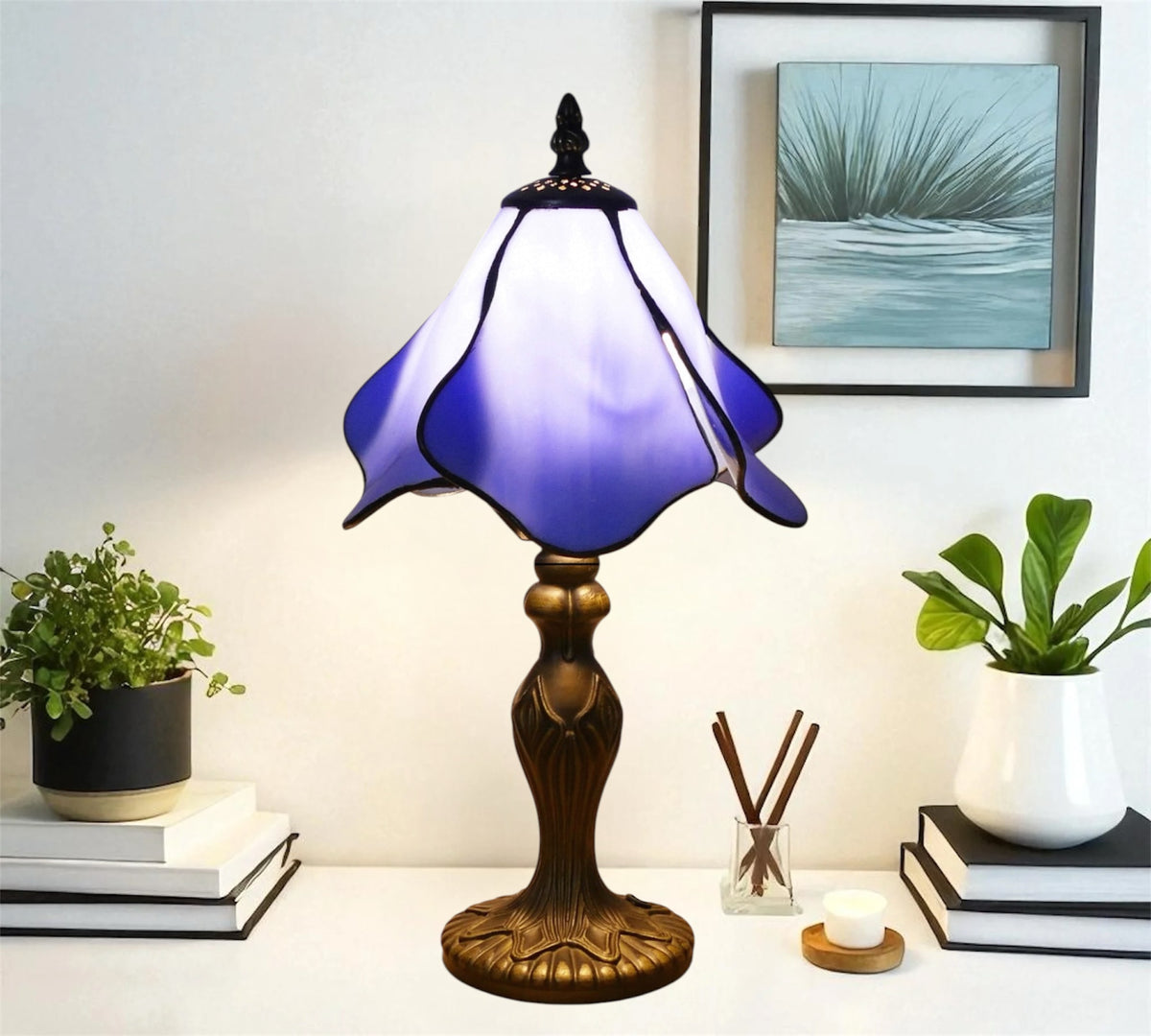 Stained glass table lamp with purple-blue shade and ornate gold base