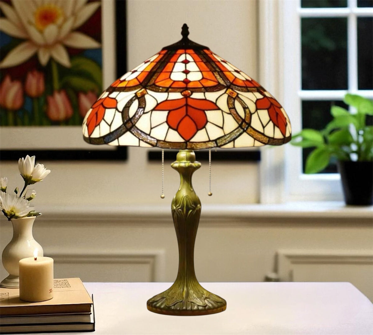 Tiffany table lamp with dome stained glass shade in orange and cream, bronze base
