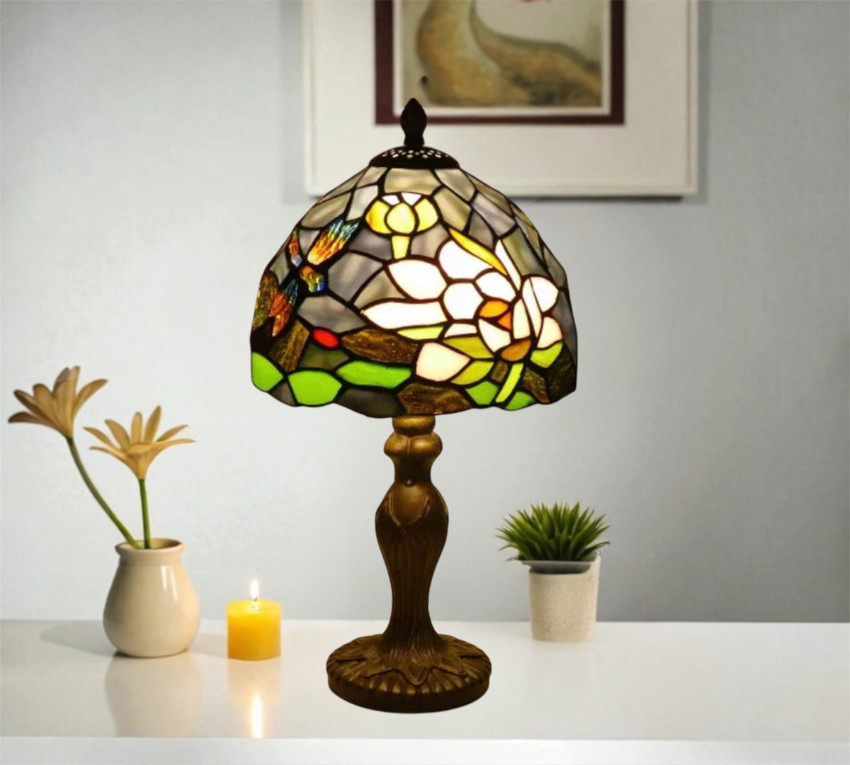 Tiffany-style stained glass table lamp with dome shade and turned bronze stand