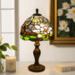 Tiffany-style stained glass table lamp with rounded multicolor mosaic shade and bronze base