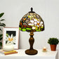 Stained glass table lamp with multicolor dome shade and dark bronze round base