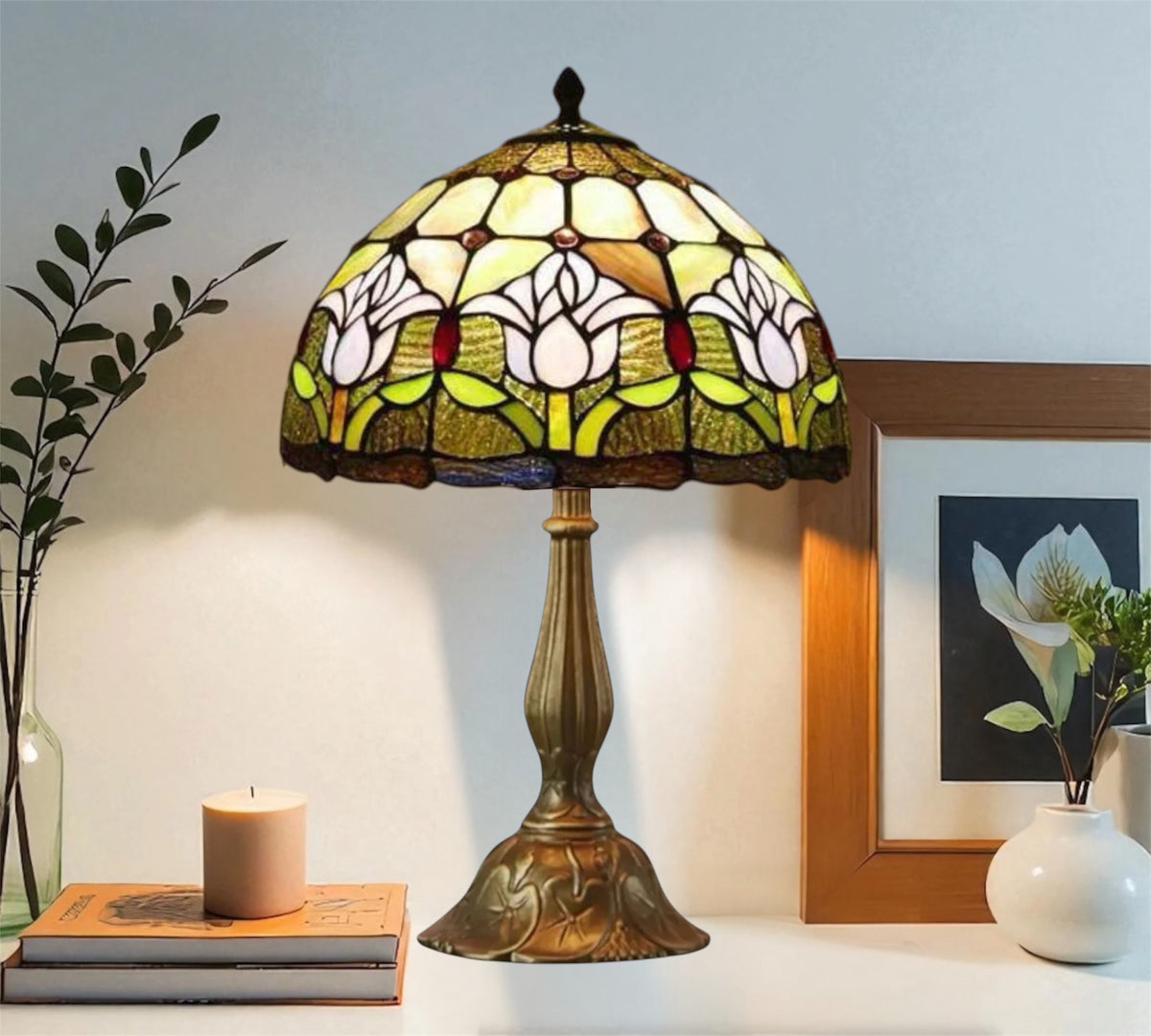 Tiffany-style stained glass table lamp with arched multicolor floral shade and bronze base
