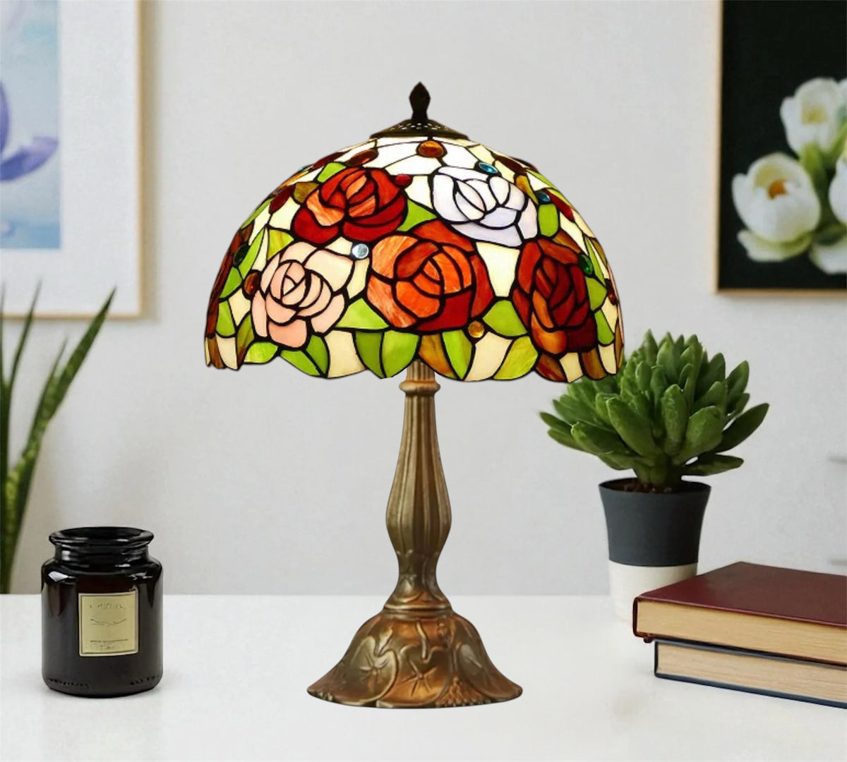 Tiffany-style stained glass table lamp with colorful floral shade and bronze metal base
