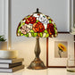 Tiffany-style stained glass table lamp with multicolor floral shade and bronze metal base