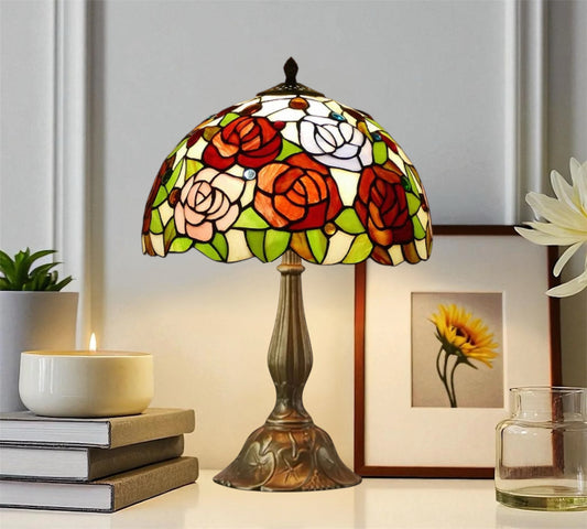 Tiffany-style stained glass table lamp with multicolor floral shade and bronze metal base