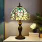 Tiffany table lamp with stained-glass dome shade and dark bronze pedestal base
