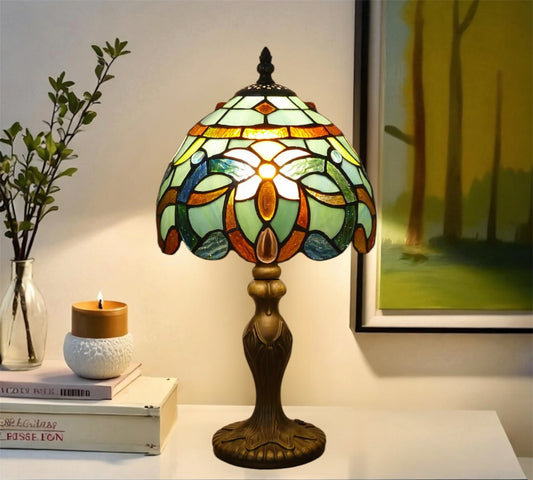 Stained-glass table lamp with rounded multicolor shade and bronze base
