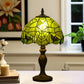 10-inch Tiffany table lamp with green stained-glass dome shade and dark metal base