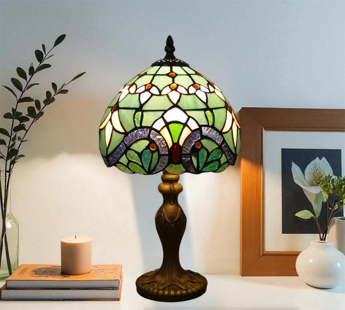 Stained glass table lamp with arched multicolor shade and dark metal pedestal base