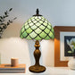 10-inch stained glass table lamp with green scalloped shade and ornate metal base