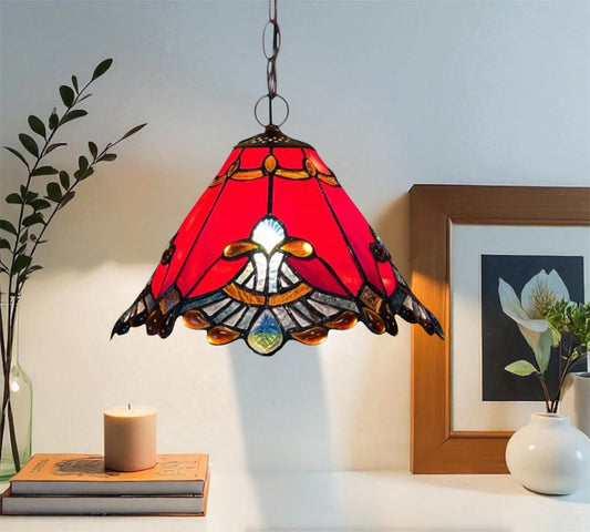 Red Tiffany-style pendant lamp with hanging chain and central white glass motif