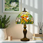 Tiffany stained glass table lamp with multicolor shade on bronze pedestal base