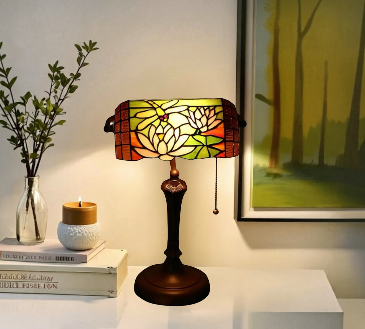 Stained glass table lamp with floral shade in warm amber and red panels; dark base