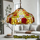 Multicolor floral stained-glass pendant lamp shade with hanging chain above table