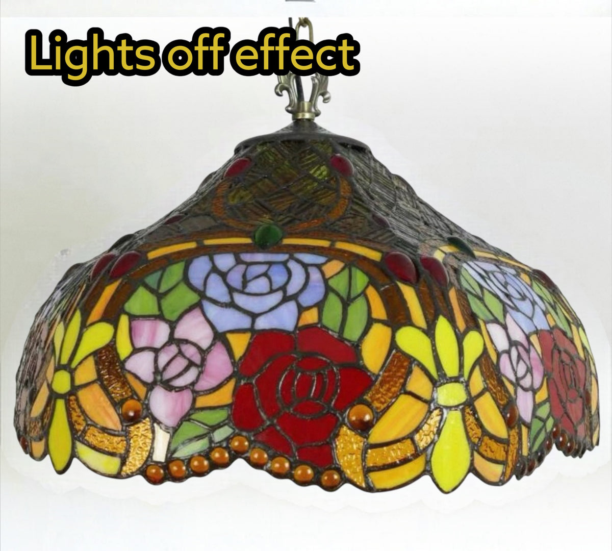 Stained glass floor lamp shade with colorful floral leaf pattern and bronze stem