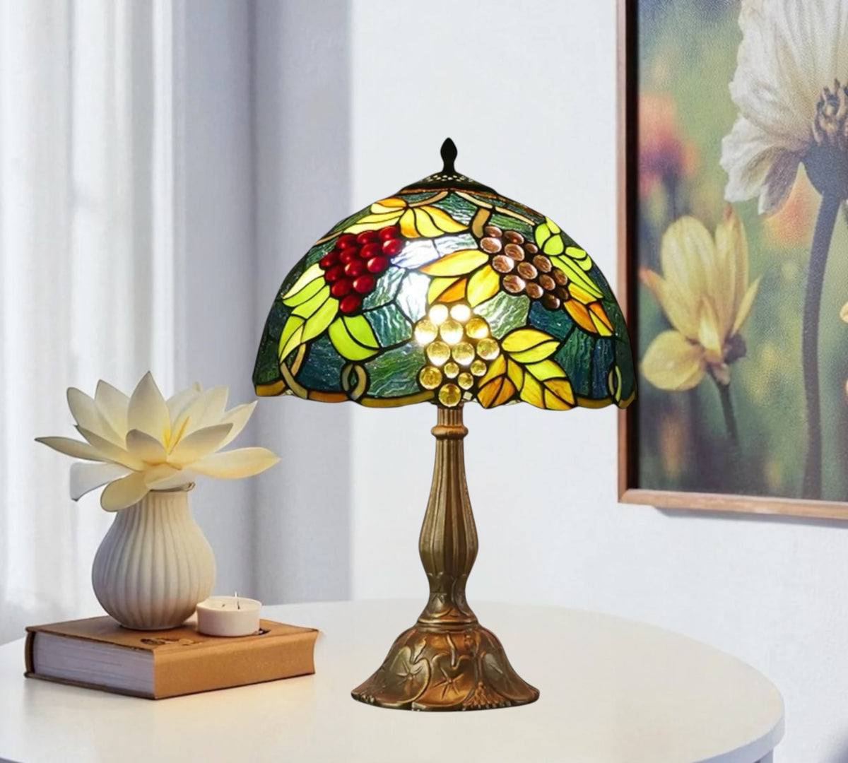 Tiffany table lamp with stained-glass grape dome shade on bronze pedestal base