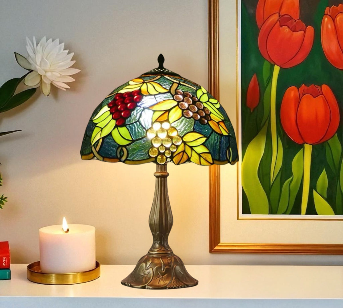 Tiffany table lamp with stained-glass grape dome shade and bronze footed base