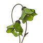 Close-up of green stained glass water lily table lamp shades on curved metal stems