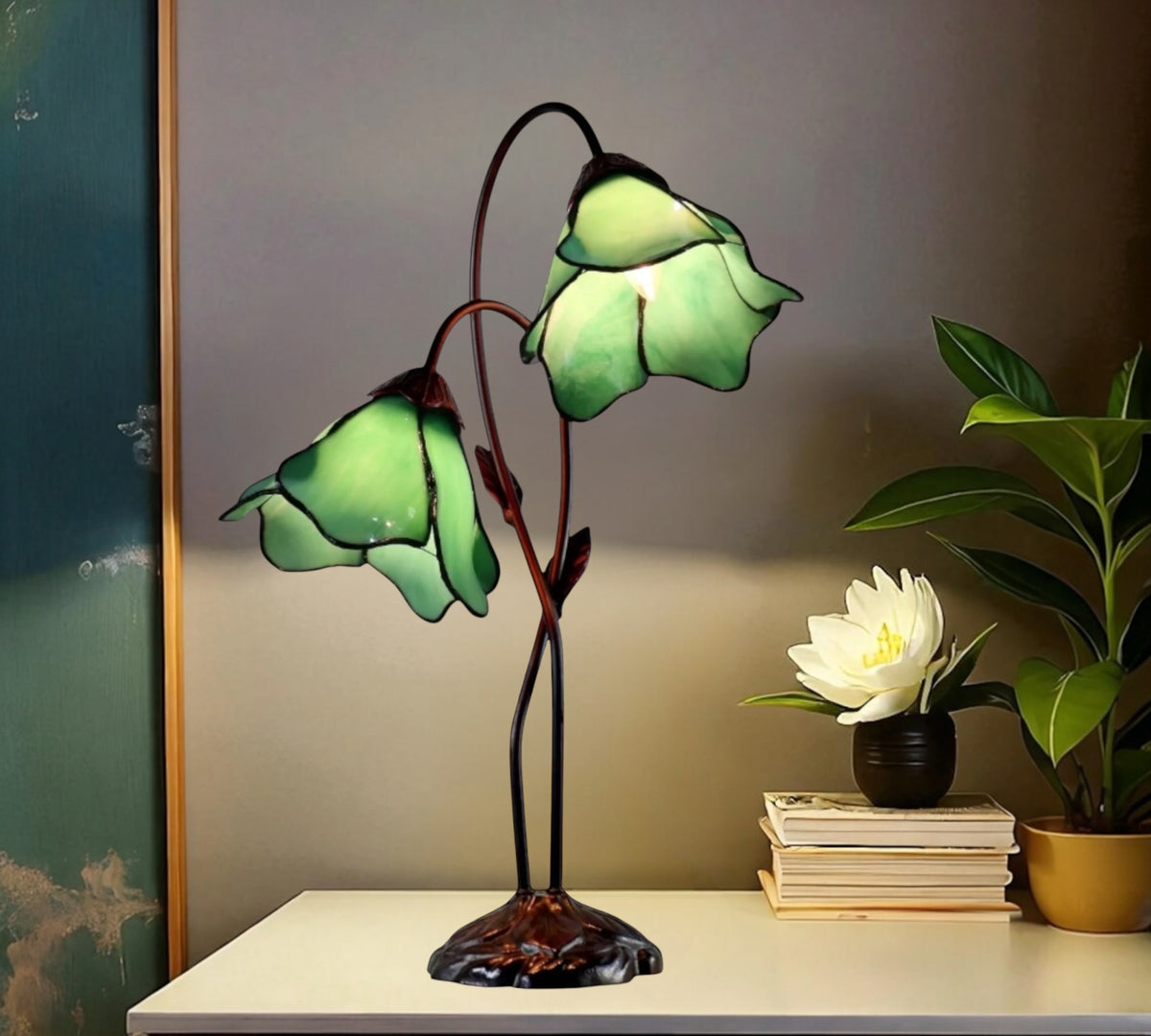 Green stained glass water lily table lamp with three lit flower shades and metal base